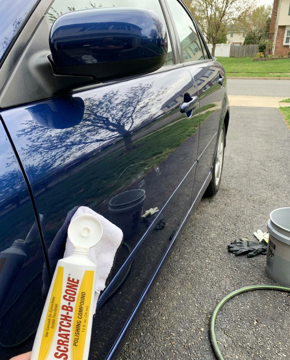 Scratch remover used on a parked car