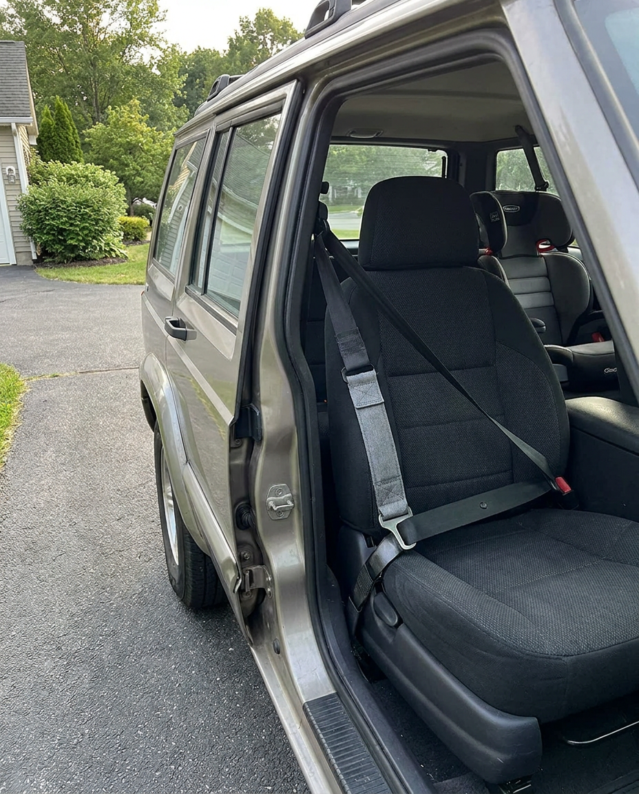 Seat belt extender used in a parked car