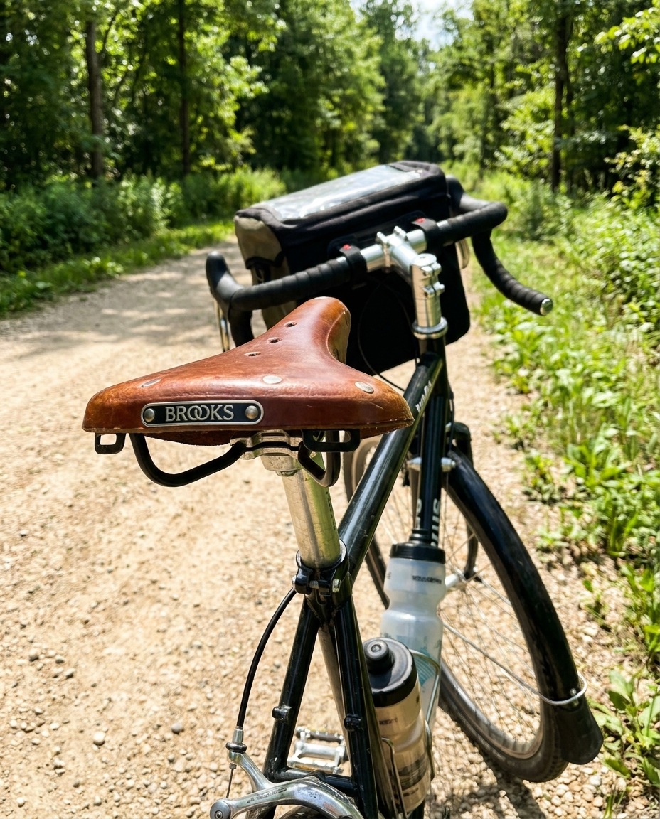 Comfortable bike saddle installed on a bicycle outdoors
