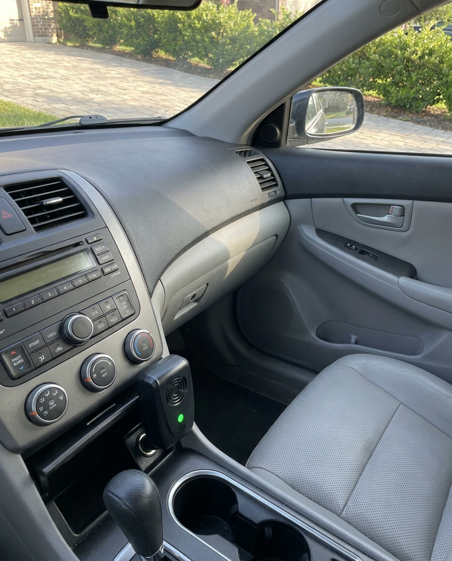 Vehicle mice repeller plugged into a car's interior power outlet